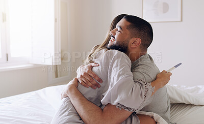 Buy stock photo Couple, hug and happy for pregnancy test in bedroom, home and support to celebrate good news. Excited man, woman and partner hugging in celebration of pregnant results, future family or ivf fertility