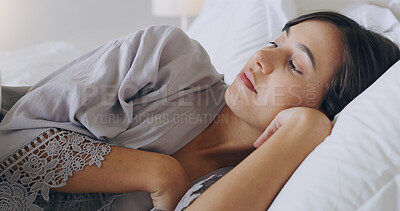 Buy stock photo Woman, tired and thinking in bed, home or relax on holiday with vision, memory or ideas in morning. Girl, bedroom and remember with anxiety, mindfulness or fear at hotel, house or vacation in Mexico