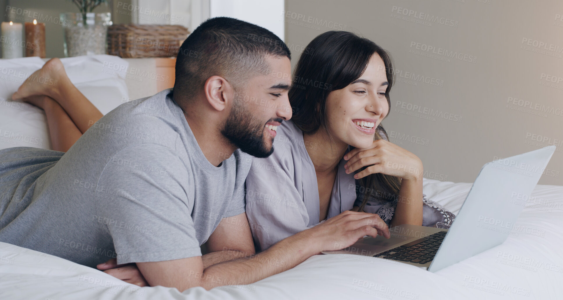 Buy stock photo Happy, couple and relax with laptop in bedroom for watching subscription movies, download media and online shopping. Man, woman and computer tech for streaming, internet or happiness together at home