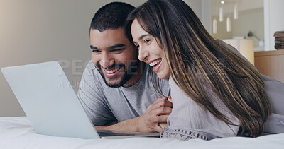 Buy stock photo Happy, couple and watching movie on laptop in bedroom for online subscription, media download or relax together. Young man, woman and computer technology for streaming, internet or connection at home