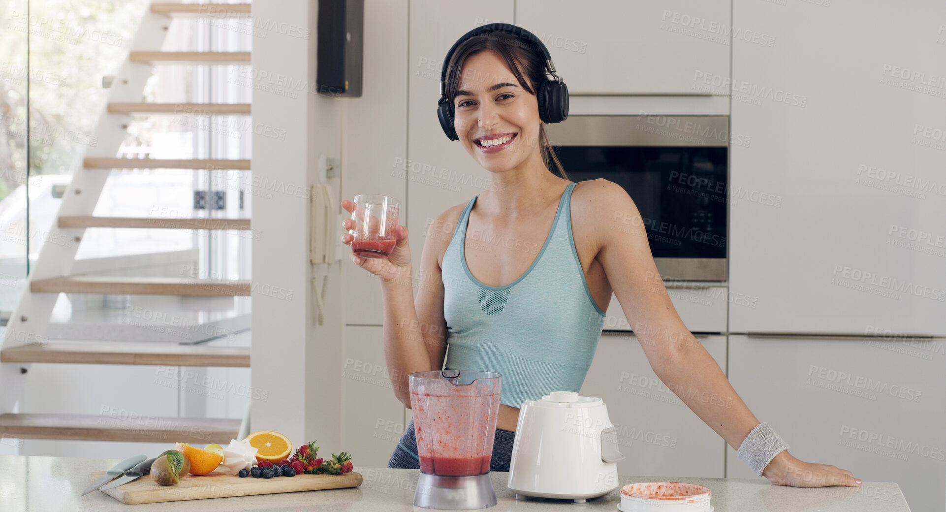 Buy stock photo Blender, smoothie or portrait of a happy woman for diet, detox or healthy breakfast fruits in kitchen. Headphones or fit girl smiling with natural drink, protein shake or vegan juice for nutrition