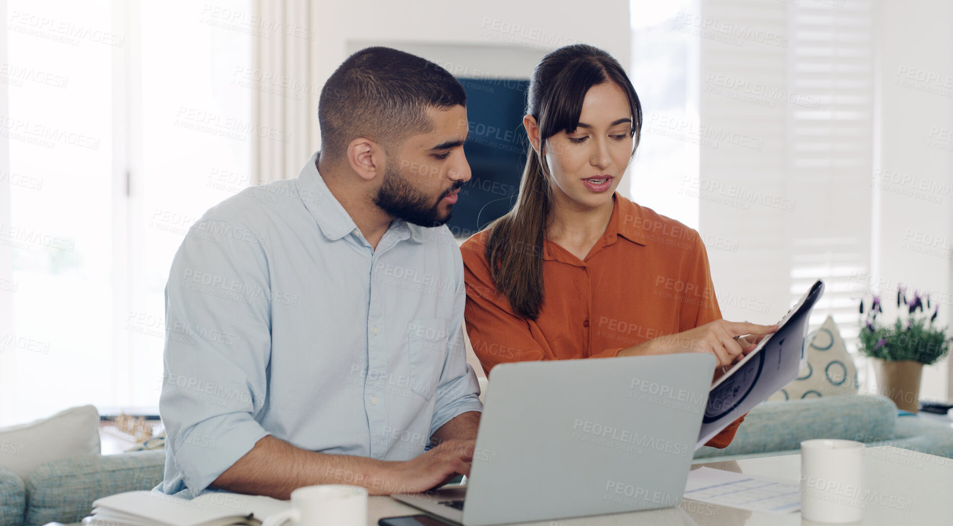 Buy stock photo Laptop, documents and couple planning bills, debt or mortgage payments together in the living room. Technology, financial paperwork and young man and woman paying with online banking in their home.