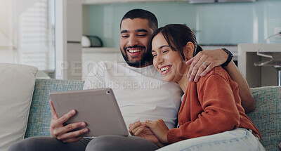 Buy stock photo Tablet, couple and laughing on couch in home for social media, funny news and online meme. Happy man, woman and relax with digital technology, subscription and streaming comedy on network connection
