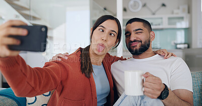 Buy stock photo Home, selfie and couple with crazy face on sofa for social media post, online vlog and internet. Dating, love and happy man and woman take funny picture for update, emoji and relax in living room