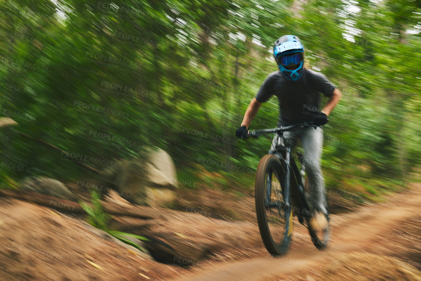 Buy stock photo Mountain bike, man and motion blur in forest for adventure, speed and power. Athlete, sports and bicycle for outdoor action, off road competition and cardio fitness for adrenaline, freedom and trail