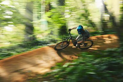 Buy stock photo Mountain bike, motion blur and cycling in forest for adventure, speed and power from above. Athlete, fast sports and bicycle for outdoor action, cardio and path park for adrenaline, freedom and trail