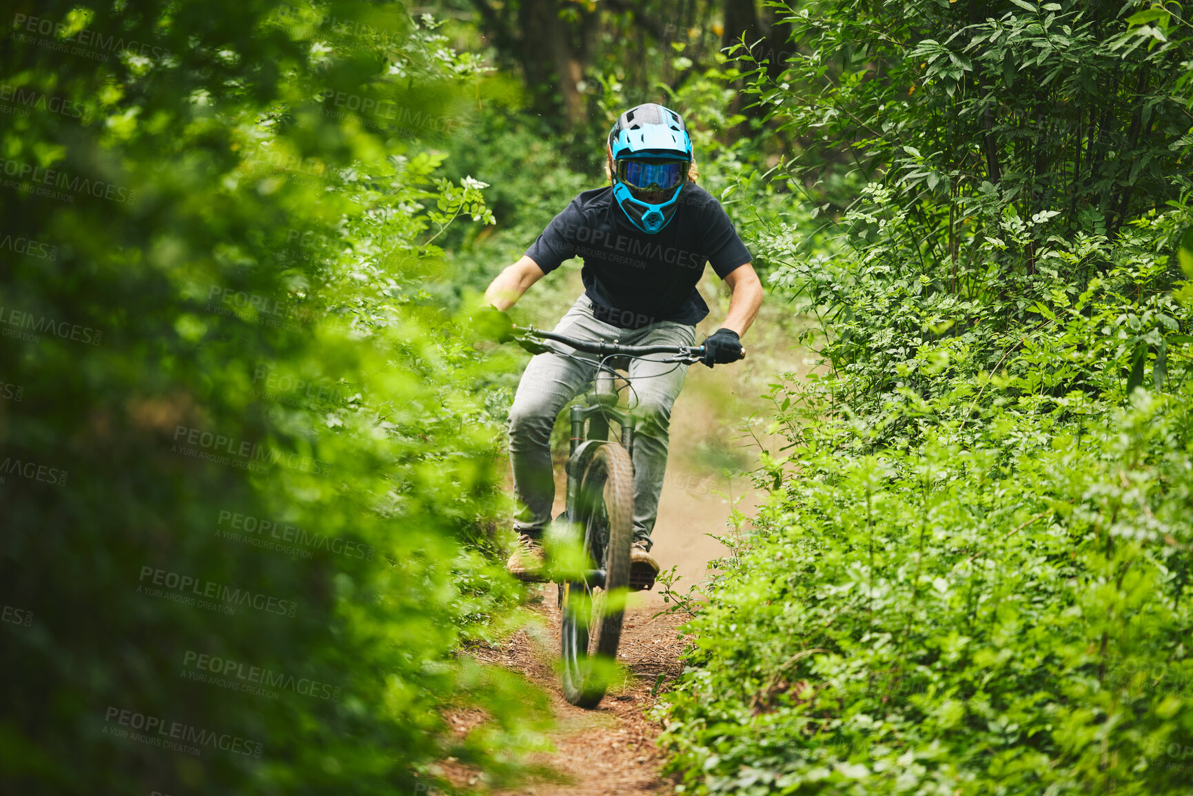 Buy stock photo Man, mountain bike and extreme sports in forest for adventure, speed and power in park. Athlete, freedom and bicycle race for outdoor action, off road fitness and gear of cardio competition in nature