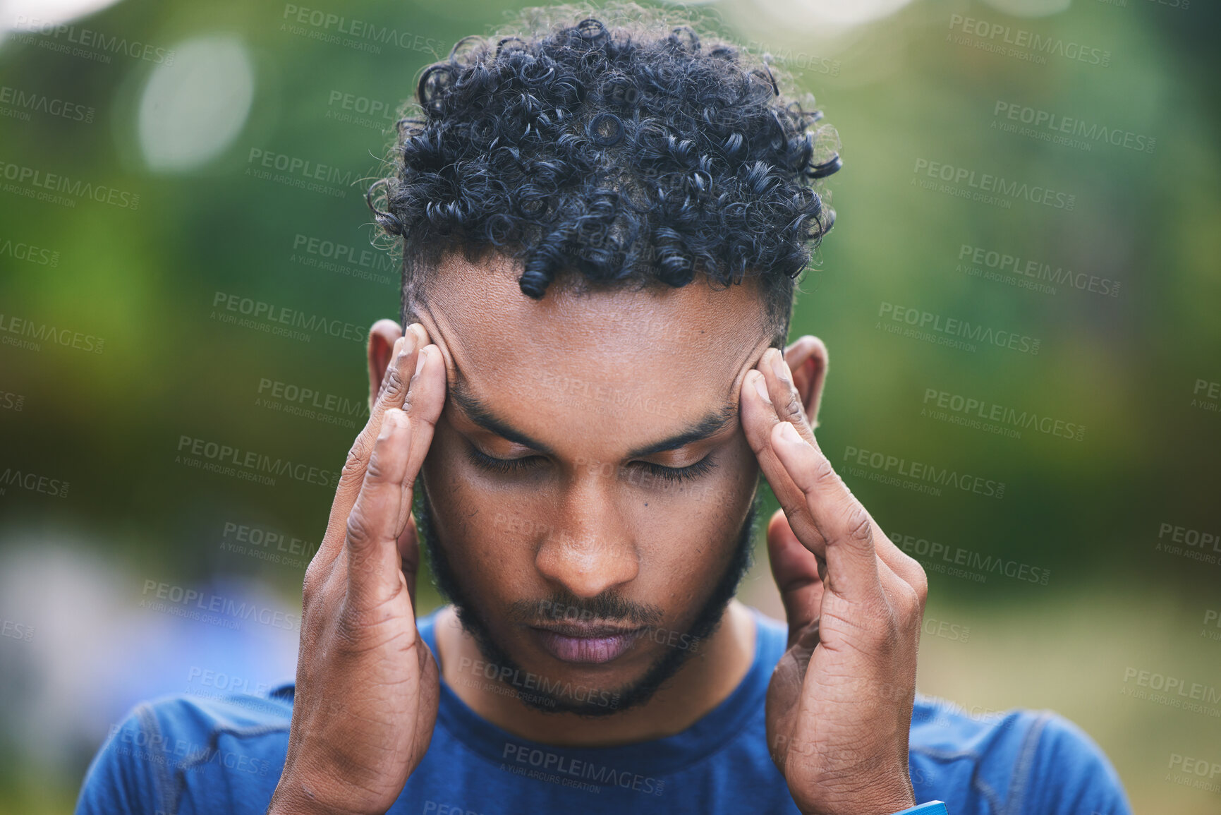 Buy stock photo Sports, fitness and man with headache in nature after workout, exercise and marathon training outdoors. Medical emergency, health and stressed male person with migraine, head injury and ache in park