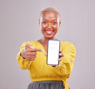 Buy stock photo Phone screen, mockup and portrait of woman isolated on studio background, mobile app and advertising space. African person or online user point to cellphone mock up for website, contact or ux design
