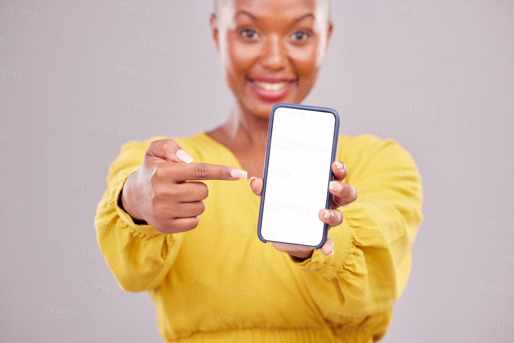 Buy stock photo Phone screen, pointing and portrait of woman isolated on studio background, mobile app and advertising mockup. African person or online user on cellphone mock up, website space or social media design