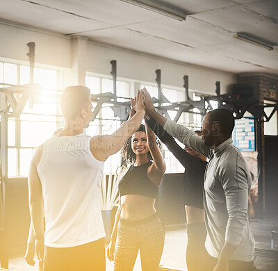 Buy stock photo Celebration, high five and teamwork of people in gym for fitness, team building or solidarity. Collaboration, group of happy friends and celebrate workout targets, goal or support with lens flare.