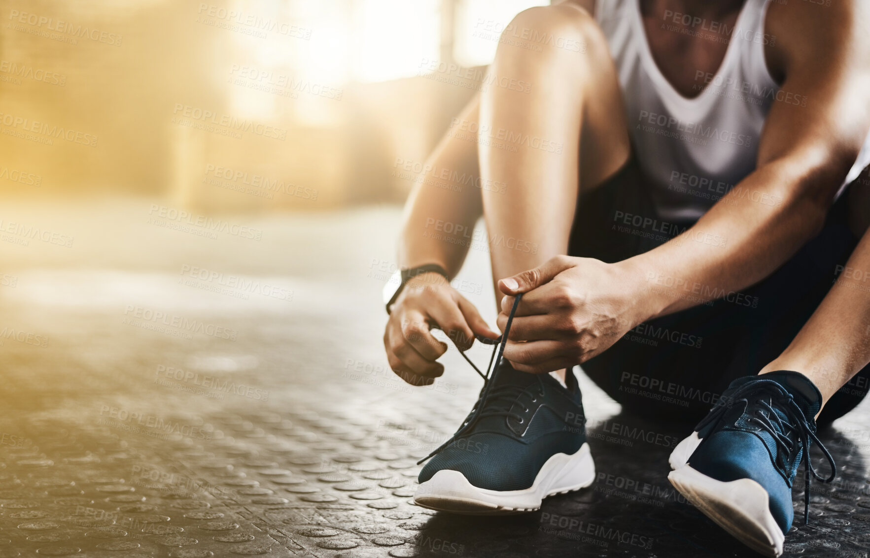 Buy stock photo Fitness, gym and man tie shoes before a workout for health, wellness and endurance training. Sports, healthy and closeup of male athlete preparing while tying laces before a exercise in sport center.