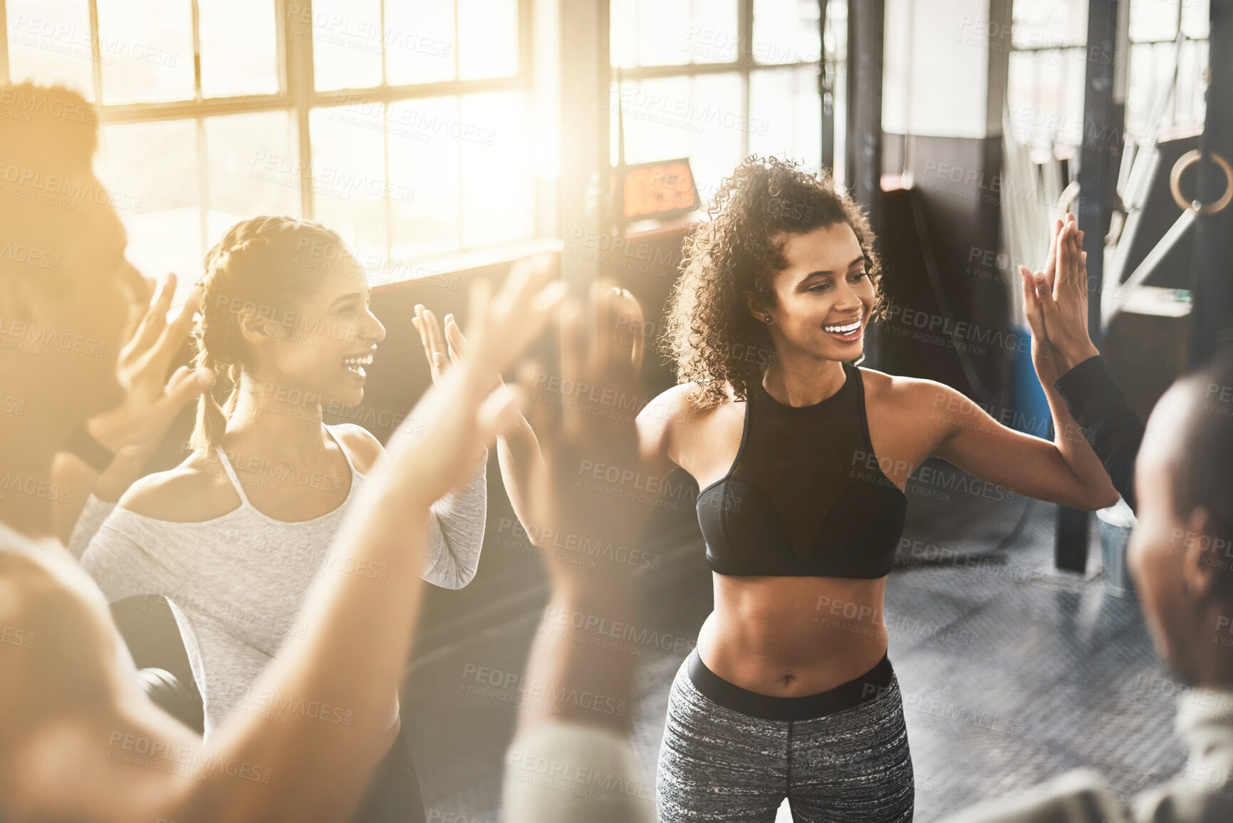 Buy stock photo Laughing, high five and collaboration of people in gym for fitness, team building and solidarity. Teamwork, group of friends and celebration for sports targets, goal or support, success or trust.