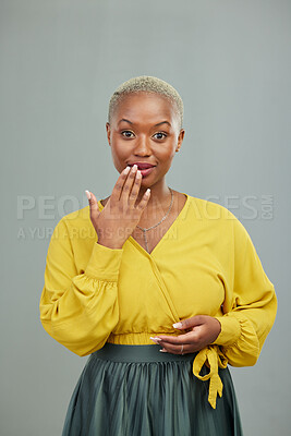Buy stock photo Black woman, hand and mouth for surprise in studio portrait for secret, mistake or wow by background. African model, girl or fashion with gesture, sign or smile for story, news or gossip by backdrop