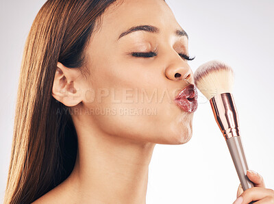 Buy stock photo Beauty, makeup brush and woman in a studio with a natural, cosmetic and luxury face routine. Glamour, cosmetology and female model with a cosmetics product for cheeks isolated by a white background.