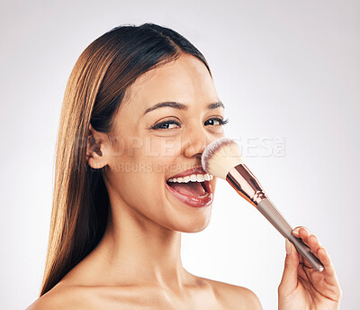 Buy stock photo Makeup brush, portrait and excited woman in studio with a natural, cosmetic and luxury face routine. Glamour, cosmetology and female model with beauty product for cheeks isolated by white background.