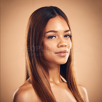 Buy stock photo Beauty, hair and portrait of woman for wellness, keratin treatment and haircare aesthetic in studio. Salon, hairdresser and face of female person on brown background for growth, shine and texture