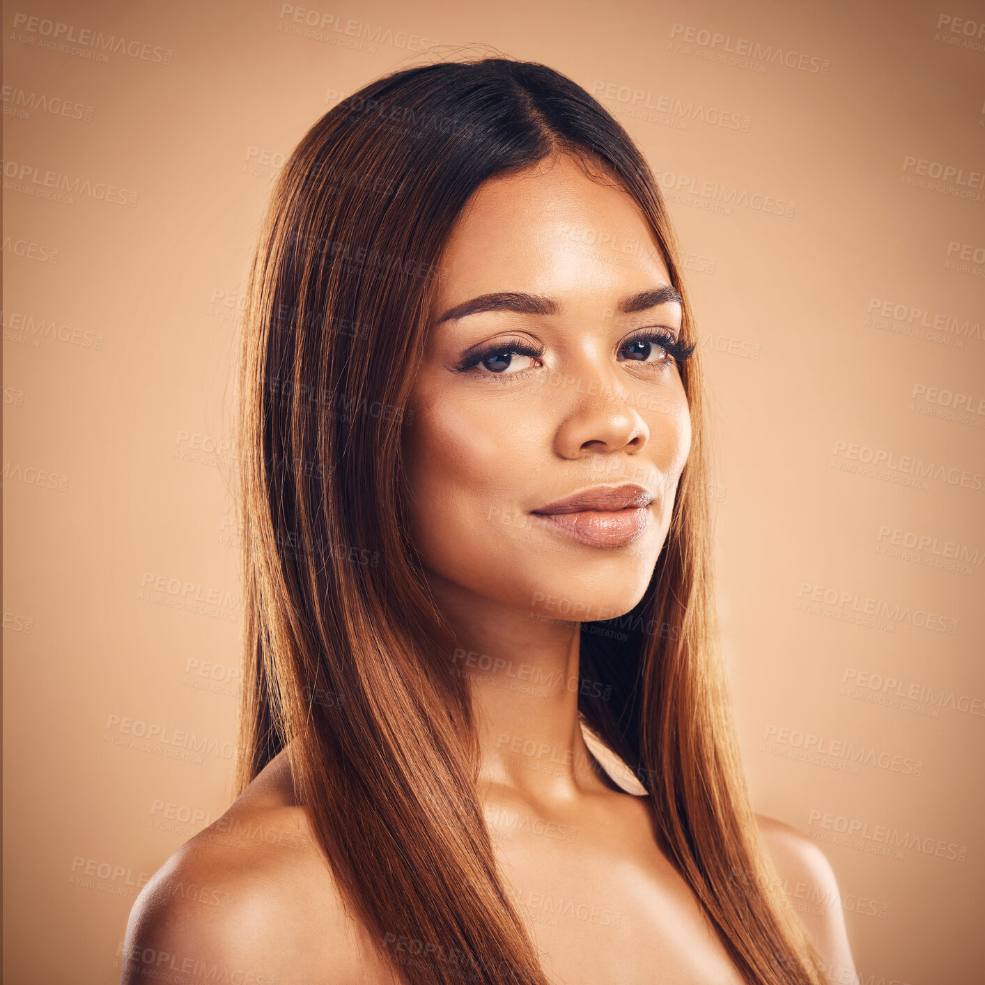 Buy stock photo Beauty, hair and portrait of woman for wellness, keratin treatment and haircare aesthetic in studio. Salon, hairdresser and face of female person on brown background for growth, shine and texture