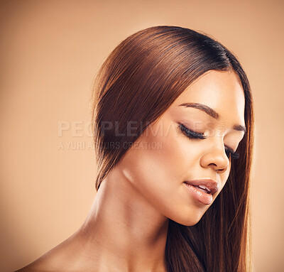 Buy stock photo Beauty, hair and face of woman in studio for wellness, keratin treatment and haircare aesthetic. Salon, hairdresser and female person with makeup on orange background for growth, shine and texture