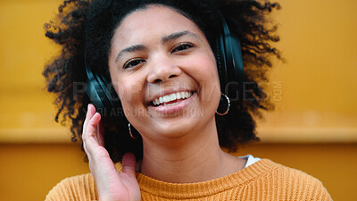 Buy stock photo Woman, headphones and smile in portrait, street and city with face, sound tech and freedom. African girl, audio streaming subscription and happy outdoor for listening, podcast or radio in metro road