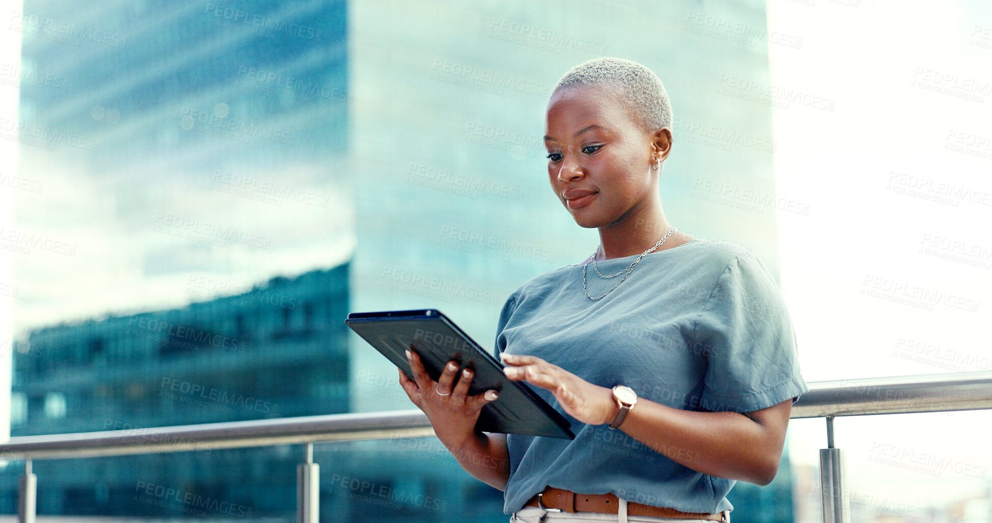 Buy stock photo Tablet, research and a business black woman on the balcony of her office in the city for planning. Technology, buildings and space with a young professional employee reading information online