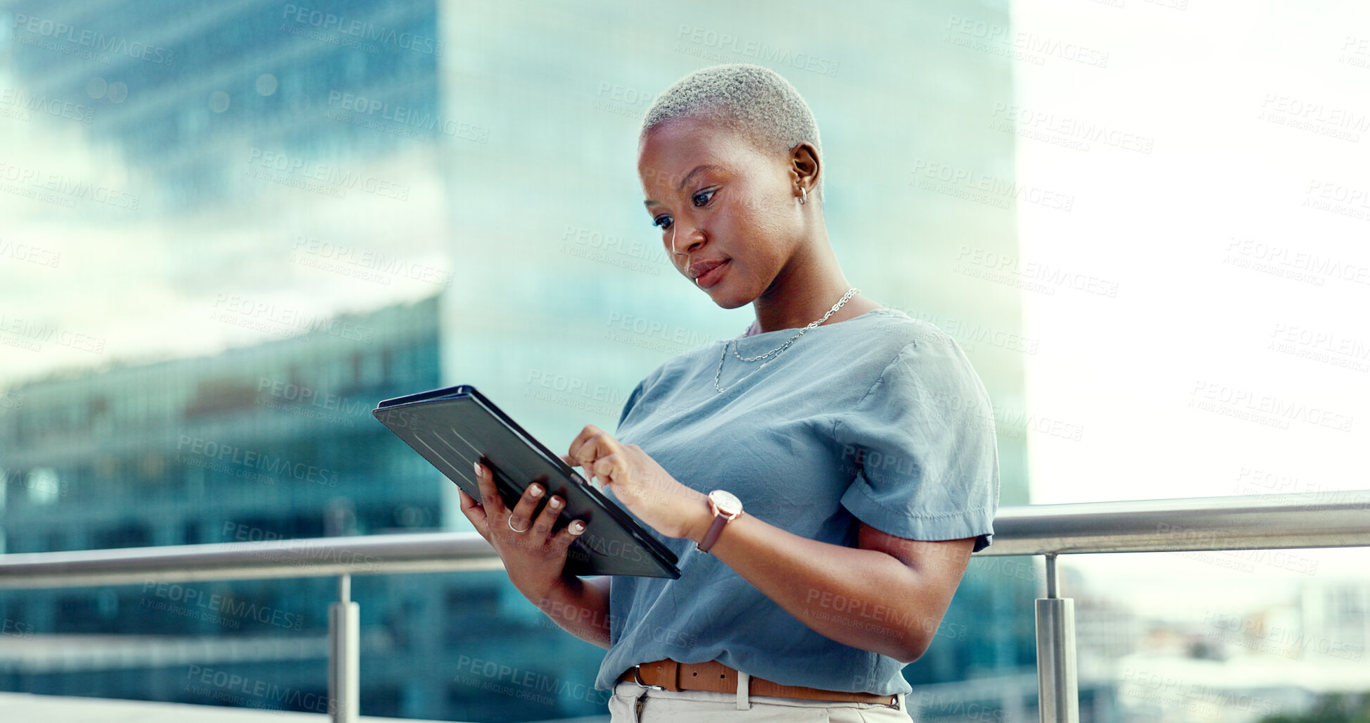 Buy stock photo Tablet, space and a business black woman on the balcony of her office in the city for planning. Technology, buildings and research with a young professional employee reading information online