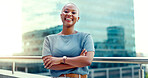 Black woman in city for business portrait while happy and arms crossed outdoor with vision and pride. Face of entrepreneur person with urban buildings and motivation for career goals as future leader