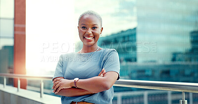 Black woman in city for business portrait while happy and arms crossed outdoor with vision and pride. Face of entrepreneur person with urban buildings and motivation for career goals as future leader