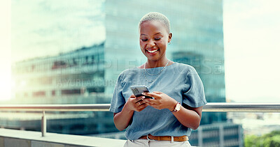 Black woman, phone and city business while happy and typing online for communication. Face of entrepreneur person with urban building background while on social media, writing post or trading website