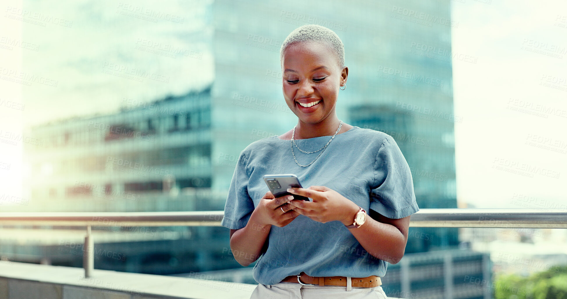 Buy stock photo Black woman, business and phone for typing online, communication and internet with smile. Face, entrepreneur and person in urban building background on social media, writing post or trading website