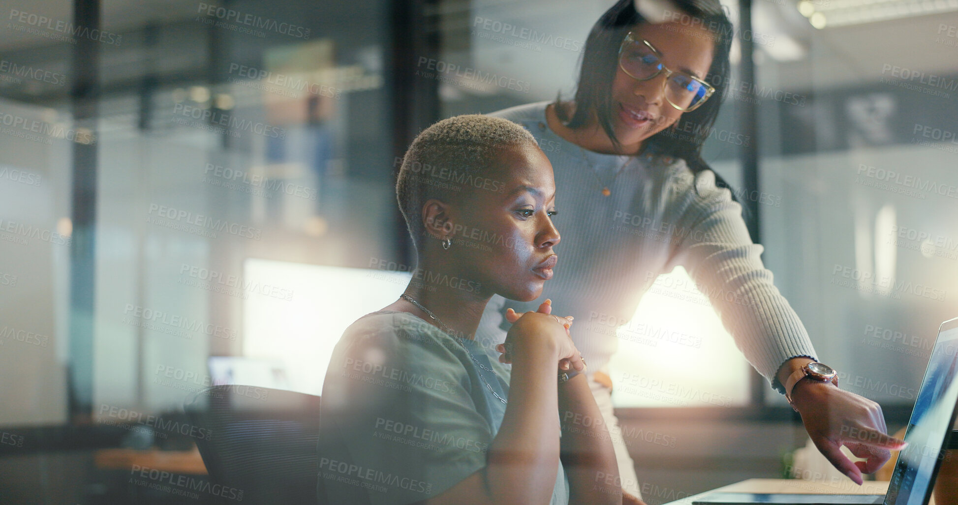 Buy stock photo Business women, teamwork and training on computer for marketing research, information and feedback in night office. Professional manager and employee on laptop, social media planning or collaboration