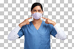PNG Portrait of a young doctor pointing to her surgical face mask 