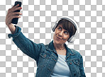 PNG studio shot of a senior woman taking selfies while wearing headphones against a grey background