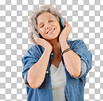 One happy mature caucasian woman wearing headphones and listening to music while dancing against isolated on a png background. Smiling white woman feeling free while expressing through dance