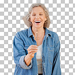 One happy mature caucasian woman playing with a sparkler on her birthday while posing in the studio. Smiling white lady showing joy and happiness while celebrating isolated on a png background