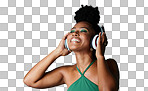 A happy and black woman in headphones with music playing from a Jamaican dance hall and reggae radio audio playlist. Freedom and young African girl enjoying listening fun, streaming and sounds isolated on a png background