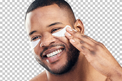 Buy stock photo Studio shot of a handsome young man wearing under-eye patches against a white background