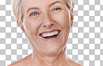 Portrait of a happy mature caucasian woman with a bright smile, showing her natural looking veneers while posing against a purple copyspace background. Older woman happy with her oral hygiene
