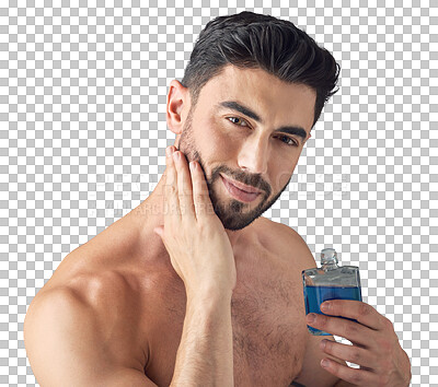 Buy stock photo Shot of a handsome young man applying aftershave