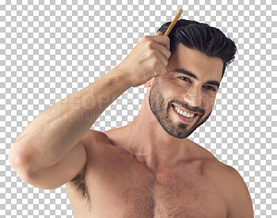 Buy stock photo Shot of a handsome young man combing his hair while standing against a grey background