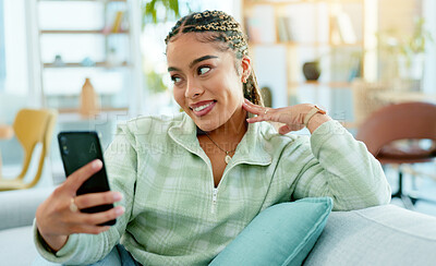 Buy stock photo Selfie, woman and phone with smile for profile picture, social media or internet post with casual style on sofa in living room. Face, smartphone and influencer or person with happiness and relaxing