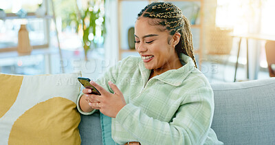 Buy stock photo Woman, typing and happy with phone on sofa in home, living room or apartment with internet communication or contact us. Funny, meme or video on social media and person chat online or scroll cellphone