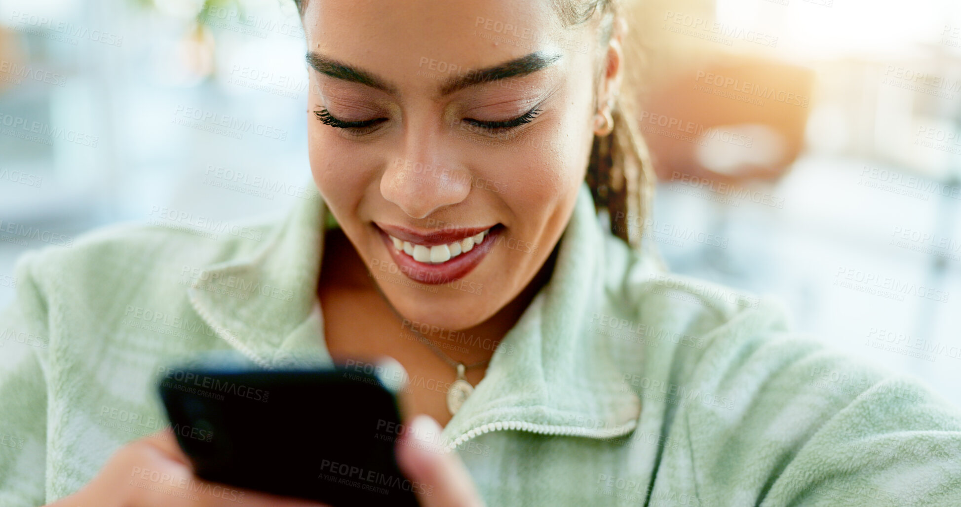 Buy stock photo Happy, woman and typing with phone on sofa in home, living room or apartment with internet communication or contact us. Funny, meme or video on social media and person chat online with cellphone