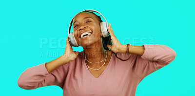 Dance, music and headphones with black woman in studio for freedom, streaming and online radio. Happiness, technology and relax with girl dancing to track, songs and audio isolated on background
