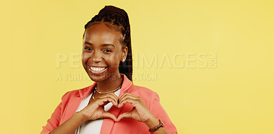 Heart hands, happy and love with black woman in studio for icon, confident and kindness. Gratitude, smile and emoji with girl and positive gesture for support, care and sign isolated on background