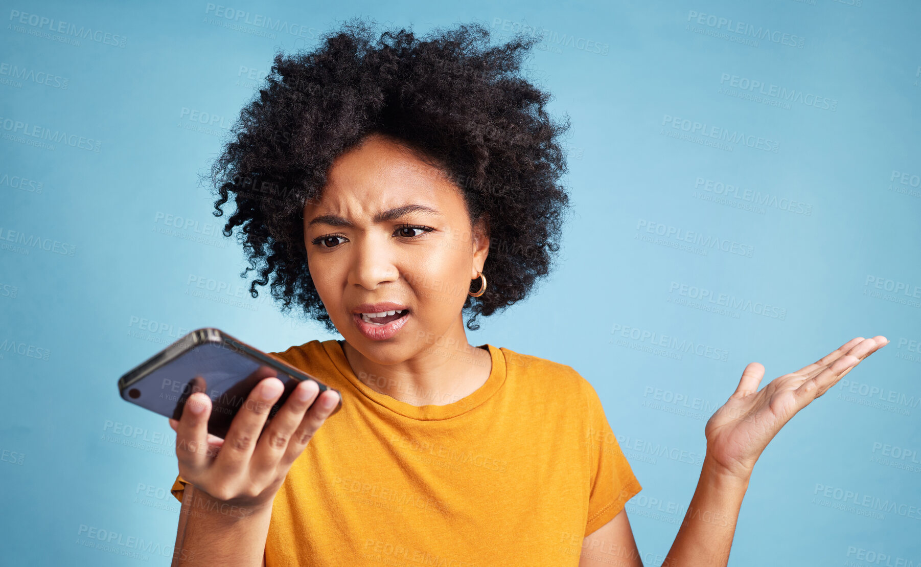 Buy stock photo Confused, phone and african woman isolated on blue background for college doubt, decision or questions. Voice, call and young person or student with what or why hand for mobile problem or choice