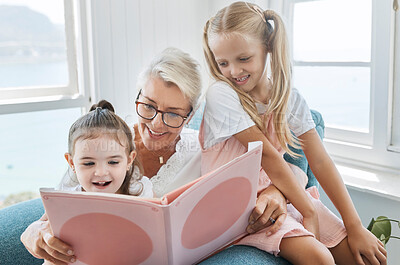Buy stock photo Book, reading and grandmother with children for learning, language development and English education in living room sofa. Senior family, elderly woman teaching kids story for kindergarten holiday fun
