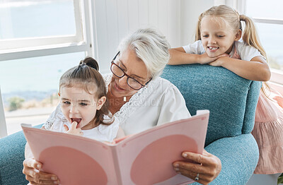 Buy stock photo Book, family and children with a grandmother and girl kids reading a story in a home living room together. Retirement, love and learning with an elderly female and sister siblings bonding in a house