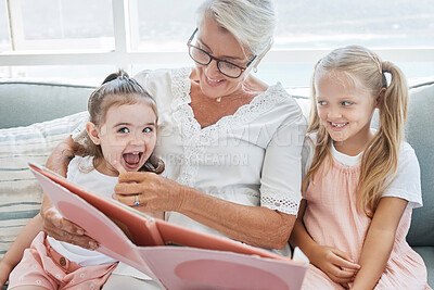Buy stock photo Grandmother, children and reading books on living room sofa in family home educational learning, funny and happy development. Grandma, girls and girl kids laughing, teaching story and relax on couch