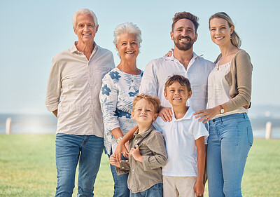 Buy stock photo Happy, big family and nature park vacation together with grandparents in retirement, children and parents smile. Summer holiday, relax outdoors and portrait of generations love bonding field of grass